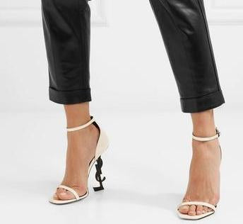 'Opyum' White Sandals in Patent Leather with a Black Heel